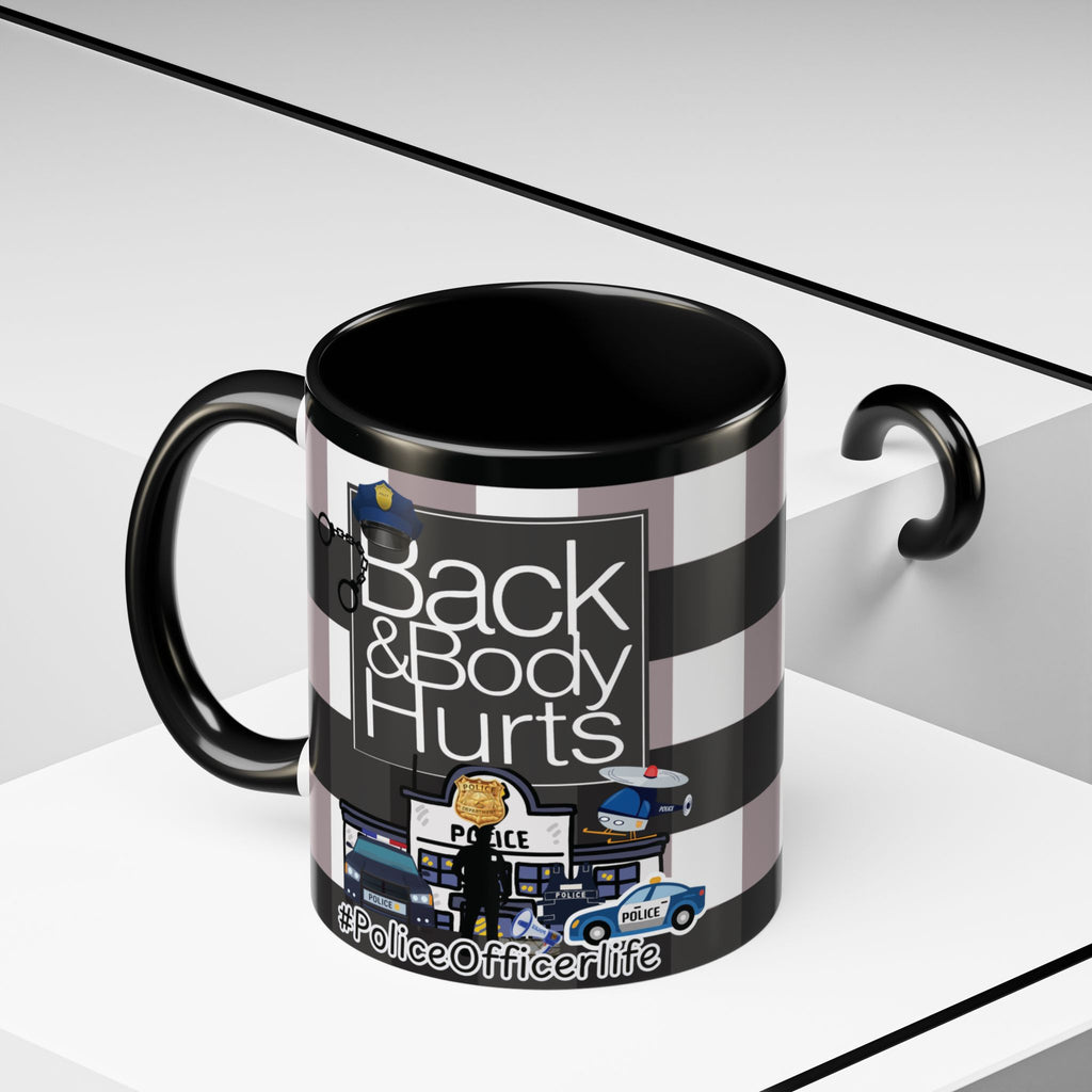 A black and white mug with a graphic design featuring a police officer and the text "Back & Body Hurts Police Officer life".