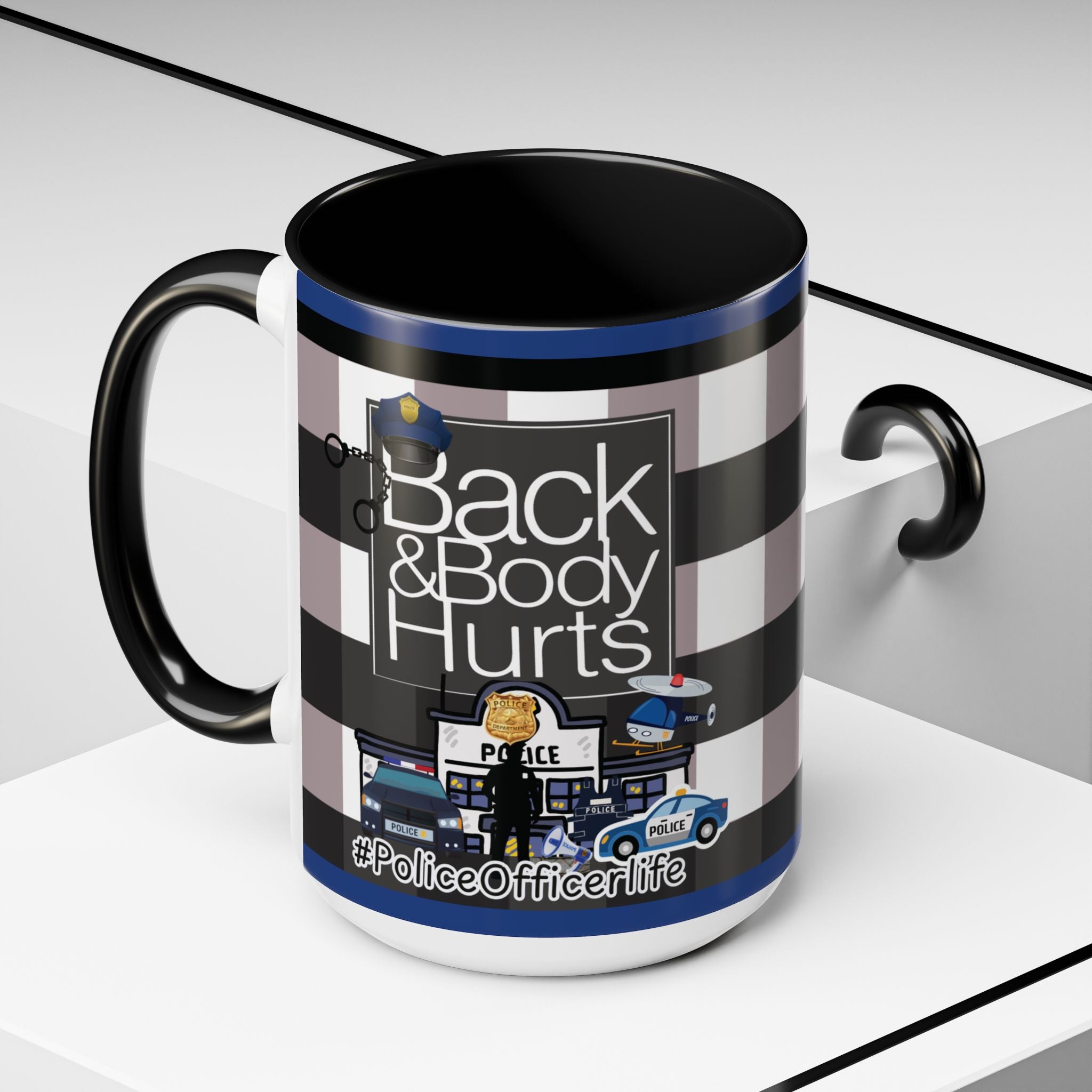 A black and white mug with a graphic design featuring police officers and a police station, along with the text "Back & Body Hurts" and "#PoliceOfficerLife".
